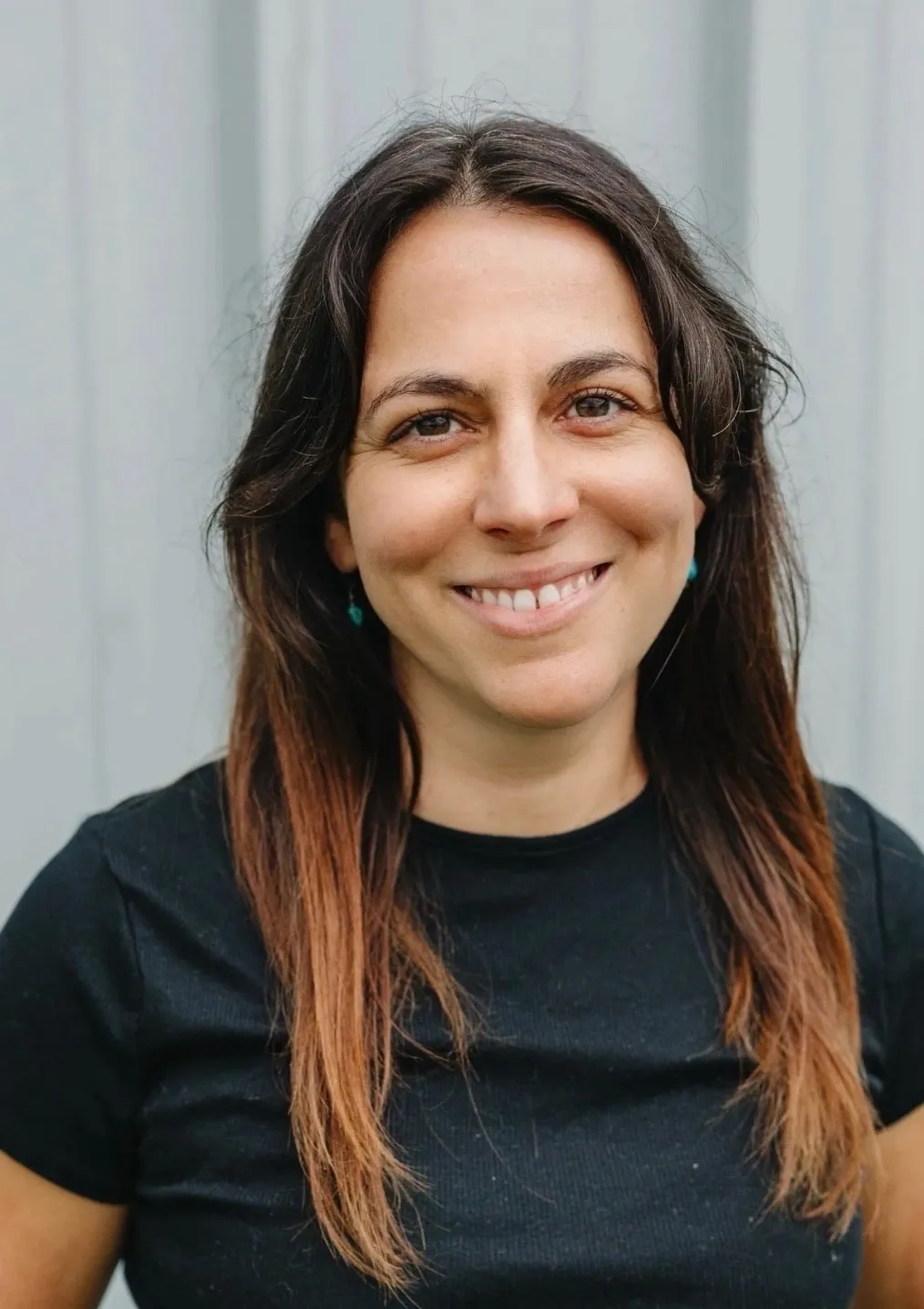 Briana, terapeuta de masaje con licencia y dueña de Bodywork by Briana